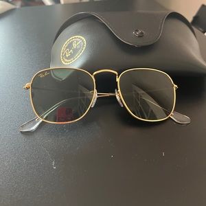 Gold and black Ray-Ban sunglasses